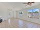 Light-filled living room with large windows, enhancing the open feel and showcasing the tile flooring at 3808 Lilac Haze St, Las Vegas, NV 89147