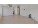 Large living room featuring neutral tile floors and abundant natural light at 3808 Lilac Haze St, Las Vegas, NV 89147