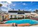 Stunning backyard showcasing a sparkling pool, spa, and lush landscaping for ultimate outdoor enjoyment at 3916 Green Leaf Dr, Las Vegas, NV 89120