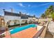 Inviting backyard featuring a pristine pool, diving board and lounging area perfect for relaxation and entertainment at 3916 Green Leaf Dr, Las Vegas, NV 89120