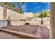 Serene backyard with rock landscaping, featuring a fire pit area, perfect for relaxation and gatherings at 3916 Green Leaf Dr, Las Vegas, NV 89120