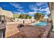 Spacious backyard featuring a pool, spa, and rock landscaping for a relaxing outdoor experience at 3916 Green Leaf Dr, Las Vegas, NV 89120