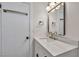 Bathroom with modern vanity, fixtures, hardware, mirror and lighting at 3916 Green Leaf Dr, Las Vegas, NV 89120