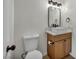 Stylish powder room features a vessel sink, modern faucet, and a framed mirror at 3916 Green Leaf Dr, Las Vegas, NV 89120