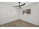 Clean bedroom with ceiling fan, window, and neutral walls at 3916 Green Leaf Dr, Las Vegas, NV 89120