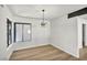 Bright dining space with ample natural light, light wood floors, and modern light fixture, perfect for Gathering gatherings at 3916 Green Leaf Dr, Las Vegas, NV 89120