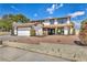 Well-maintained two-story home featuring a two-car garage, and nicely landscaped front yard at 3916 Green Leaf Dr, Las Vegas, NV 89120