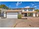 Charming two-story home boasting a two-car garage, complemented by well-kept landscaping at 3916 Green Leaf Dr, Las Vegas, NV 89120