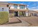 Inviting front entrance with a tiled walkway and manicured landscaping at 3916 Green Leaf Dr, Las Vegas, NV 89120