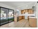 Inviting kitchen with direct access and views of the pool area through sliding glass doors at 3916 Green Leaf Dr, Las Vegas, NV 89120