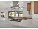 Bright, modern kitchen with stainless steel appliances, a marble countertop, and ample natural light at 3916 Green Leaf Dr, Las Vegas, NV 89120