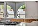 Stylish kitchen sink area with white countertops and modern fixtures at 3916 Green Leaf Dr, Las Vegas, NV 89120