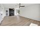 Bright living area features wood floors, fireplace, and plenty of natural light from large windows at 3916 Green Leaf Dr, Las Vegas, NV 89120