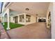 Spacious covered patio featuring artificial turf and access to parking and other outdoor amenities at 3916 Green Leaf Dr, Las Vegas, NV 89120