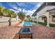 The home has a spacious backyard, a pool, and a rockscape at 3916 Green Leaf Dr, Las Vegas, NV 89120