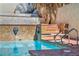 Beautiful pool with a diving board and decorative lion's head fountains at 3916 Green Leaf Dr, Las Vegas, NV 89120