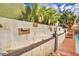 Unique landscaping with block walls and custom lighting surrounds this beautiful backyard pool at 3916 Green Leaf Dr, Las Vegas, NV 89120