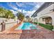 Large in-ground pool and spa in a spacious backyard area at 3916 Green Leaf Dr, Las Vegas, NV 89120