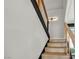 View of newly renovated staircase with wood treads and contemporary railing design at 3916 Green Leaf Dr, Las Vegas, NV 89120