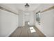 Walk-in closet with modern lighting, new floors and shelving at 3916 Green Leaf Dr, Las Vegas, NV 89120