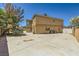 Spacious backyard features a large concrete patio, perfect for outdoor entertaining at 4 Bishopsgate Ter, Henderson, NV 89074