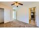 Bedroom with carpeted floors and attached bathroom and closet at 4 Bishopsgate Ter, Henderson, NV 89074