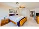 Spacious bedroom with large windows, ceiling fan, and ensuite bathroom access at 4 Bishopsgate Ter, Henderson, NV 89074