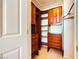 Walk in closet with custom built in shelving and drawers at 4 Bishopsgate Ter, Henderson, NV 89074