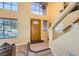 Warm foyer with tile flooring, natural light, and staircase at 4 Bishopsgate Ter, Henderson, NV 89074