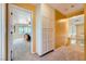 Hallway provides access to the bedroom and offers storage cabinets as well as views of downstairs at 4 Bishopsgate Ter, Henderson, NV 89074