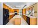 Spacious kitchen with an island, tile floors, and stainless steel appliances at 4 Bishopsgate Ter, Henderson, NV 89074