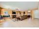Spacious living room features a fireplace, tile flooring, and large windows at 4 Bishopsgate Ter, Henderson, NV 89074