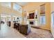 Bright living room features a fireplace, high ceilings, and an open floor plan at 4 Bishopsgate Ter, Henderson, NV 89074