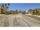 Street view of multiple single-Gathering homes with well-maintained landscaping at 4 Bishopsgate Ter, Henderson, NV 89074