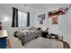 Bedroom features window, carpet, and sliding closet with toys and stuffed animals at 4330 Oasis Hill Ave, North Las Vegas, NV 89085