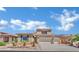 Charming two-story home with a three-car garage and well-maintained landscaping at 4330 Oasis Hill Ave, North Las Vegas, NV 89085