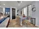 Cozy kitchen with granite countertops, stainless steel appliances, and an eat-in area near a window at 4330 Oasis Hill Ave, North Las Vegas, NV 89085