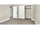 Bedroom featuring soft carpet, with two closet spaces available for optimal storage solutions at 4375 Pittsfield St, Las Vegas, NV 89115