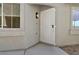Welcoming front entrance featuring a secure security door and a modern lighting fixture at 4375 Pittsfield St, Las Vegas, NV 89115