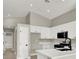 Modern kitchen featuring white cabinets, stainless steel appliances, and a stylish countertop at 4375 Pittsfield St, Las Vegas, NV 89115