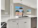 Modern kitchen featuring white cabinets, stainless steel appliances, and a stylish countertop at 4375 Pittsfield St, Las Vegas, NV 89115