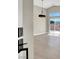 Bright living room featuring modern flooring, high ceilings, and sliding glass doors at 4375 Pittsfield St, Las Vegas, NV 89115