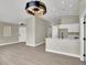 Bright living space featuring modern flooring, recessed lighting, and an open floorplan to the kitchen at 4375 Pittsfield St, Las Vegas, NV 89115