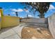 The property has a large backyard with desert landscaping and mature trees at 4419 Fairmont Cir, Las Vegas, NV 89147