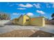 Spacious backyard featuring desert landscaping and a large concrete patio at 4419 Fairmont Cir, Las Vegas, NV 89147