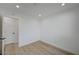 This bedroom is freshly painted, has recessed lighting, and wood-look flooring at 4419 Fairmont Cir, Las Vegas, NV 89147