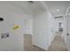 Clean, bright hallway with fresh white paint and wood-look flooring at 4419 Fairmont Cir, Las Vegas, NV 89147