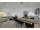Well-designed living space featuring an open floor plan connecting to the dining and kitchen areas at 4419 Fairmont Cir, Las Vegas, NV 89147