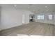 Bright, open-concept with recessed lighting and views of kitchen and dining area at 4419 Fairmont Cir, Las Vegas, NV 89147