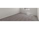 Cozy bedroom with carpeted floors, natural light, and minimalist decor at 4928 Canna Lily St, Las Vegas, NV 89122